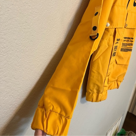 Nike 10 Deep X Pokemon Pikachu Trainer Yellow Windbreaker Jacket Medium - Picture 7 of 13